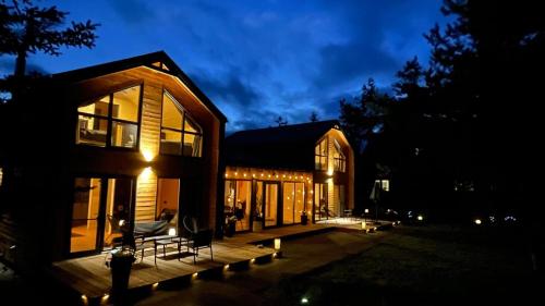 DOMKI Leśna Cisza jezioro Powidzkie dla 18 osób - 5D Apartments (DOMKI Lesna Cisza jezioro Powidzkie dla 18 osob - 5D Apartments) in Przybrodzin