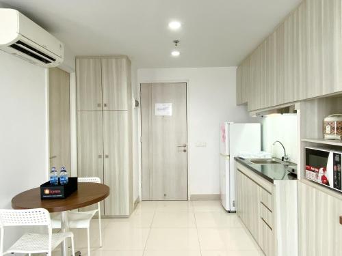 Cozy and Nice Studio at Azalea Suites Apartment By Travelio