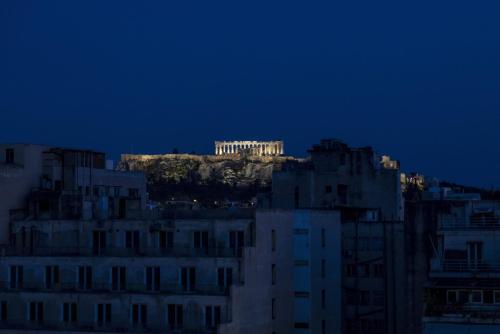 Charming 7th-Floor Apartment with Acropolis view, Atény