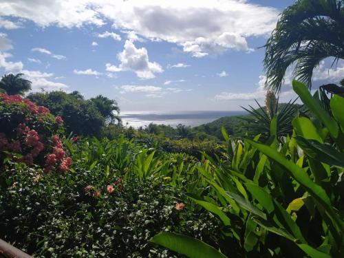 Ylang Ylang bas de villa vue mer 800m de la plage