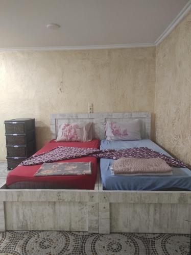 Budget double room - Tap to explore photos