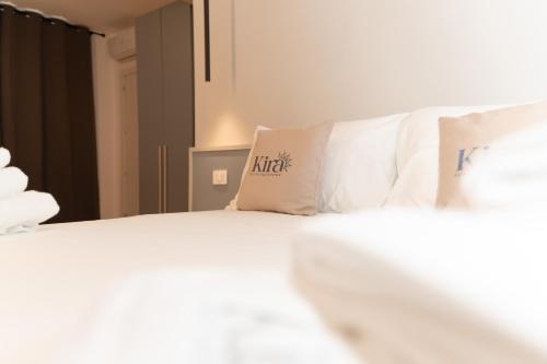 Kira Suite and Rooms - Tap to explore photos