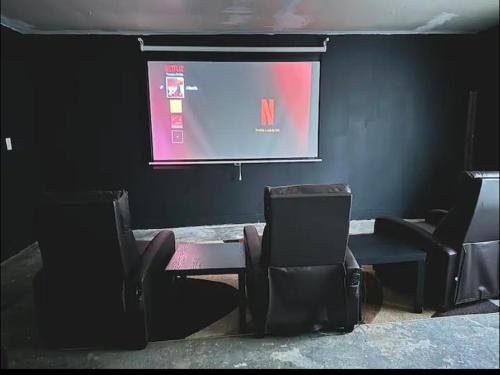 King Suite Private Entrance Movie Theater and Hot Tub in Jonesboro, USA