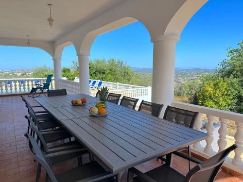 Balcony/terrace, Luxurious Villa Stardust with swimming pool & BBQ in Paderne