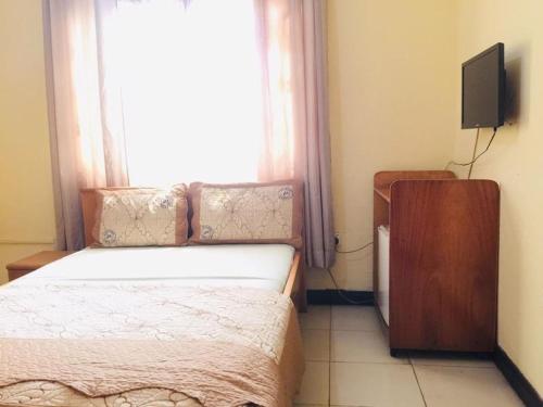 Single Room - Ground Floor in Accra, Accra (fotografie 9)
