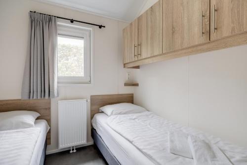 Modern ingericht chalet op groen park op de Veluwe Modern ingericht chalet op groen park op de Veluwe