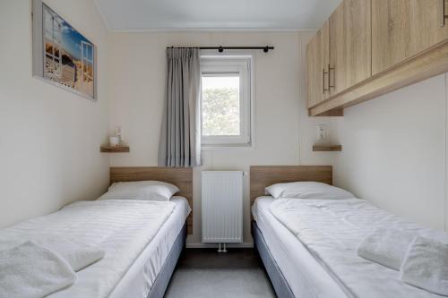 Modern ingericht chalet op groen park op de Veluwe Modern ingericht chalet op groen park op de Veluwe