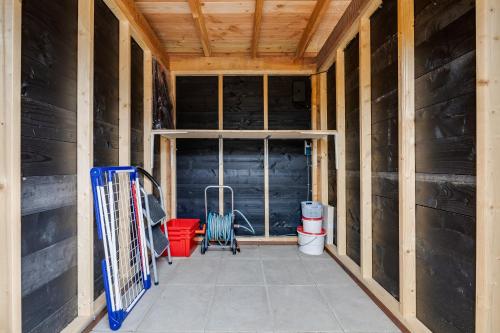 Modern ingericht chalet op groen park op de Veluwe Modern ingericht chalet op groen park op de Veluwe