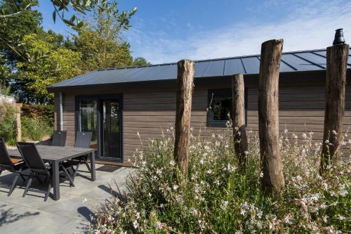 Modern ingericht chalet op groen park op de Veluwe Modern ingericht chalet op groen park op de Veluwe