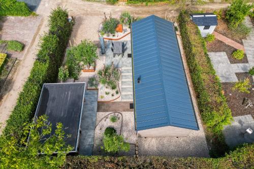 Modern ingericht chalet op groen park op de Veluwe Modern ingericht chalet op groen park op de Veluwe