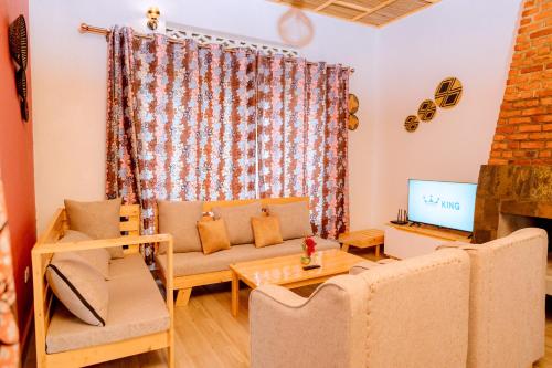 Koplietošanas atpūtas telpa ar TV, Future4Kids Kinigi Private House By Isange paradise resort in Kinigi