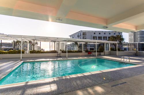 The Centurion - Pool Deck Apartment with Views! - Tap to explore photos