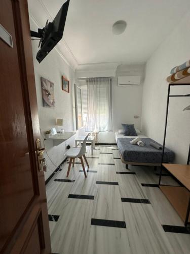Habitación individual, baño compartido