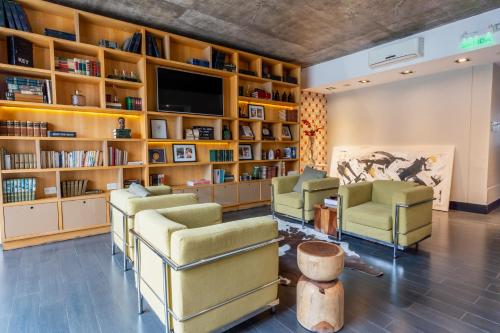 Sala de estar / sala de TV, Nuit Hotel in Playa Grande