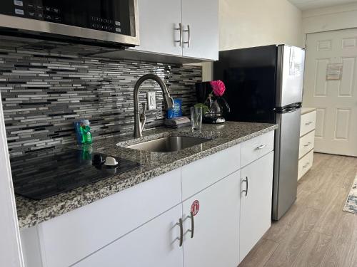 Esplanade Suites - A Sundance Vacations Property - 주방
