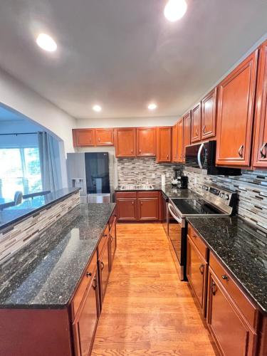 Kitchen, Modern Downtown ATL Retreat in Browns Mill Park