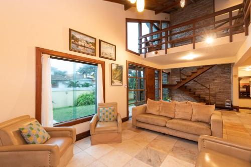 4 Suítes + Piscina e Churrasqueira | 3 Irmãos (4 Suites + Piscina e Churrasqueira | 3 Irmaos) in 福尔摩沙湾海滩