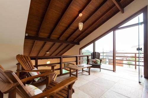 4 Suítes + Piscina e Churrasqueira | 3 Irmãos (4 Suites + Piscina e Churrasqueira | 3 Irmaos) in 福尔摩沙湾海滩