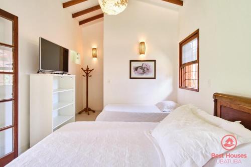 BH36. Casa na Domingas Dias Pertinho da Praia in ปรายา โด ลาซาโร