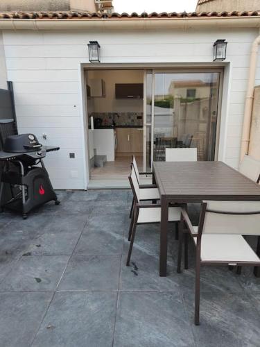 Erkély/terasz, Maison classé 3 étoiles Pérols avec terrasse et clim (Maison classe 3 etoiles Perols avec terrasse et clim) in Perols