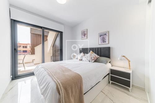 Amanecer Signature Penthouse - high-end rooftop terrace - by OYOOSTAYS - image 3