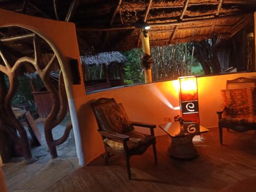 Restaurant, The Great Circle Lodge. in Nanyuki