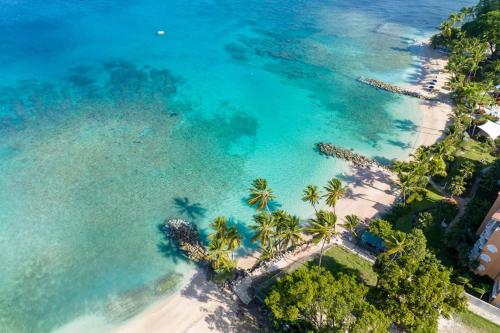 Strand, Coral Beach 202 condo in Little Battaleys