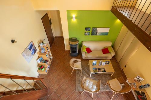 Koplietošanas atpūtas telpa ar TV, B&B Pedra Rubia in Nebida