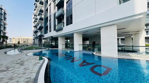 Swimming pool, Olivz Residence Furnished Cozy Studio Apartment in Dubai International City