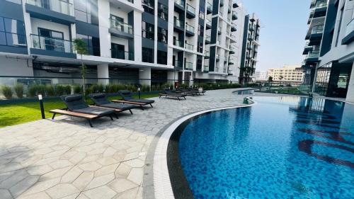 Exterior view, Olivz Residence Furnished Cozy Studio Apartment in Dubai International City