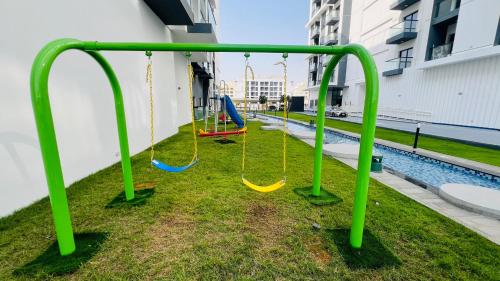 Playground, Olivz Residence Furnished Cozy Studio Apartment in Dubai International City
