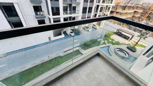 View, Olivz Residence Furnished Cozy Studio Apartment in Dubai International City