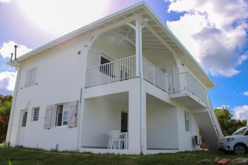 Vedere exterior, Havre de détente, F2 et studio en bas de villa avec piscine (Havre de detente, F2 et studio en bas de villa avec piscine) in Le Diamant