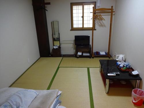 Single Room with Shared Bathroom
