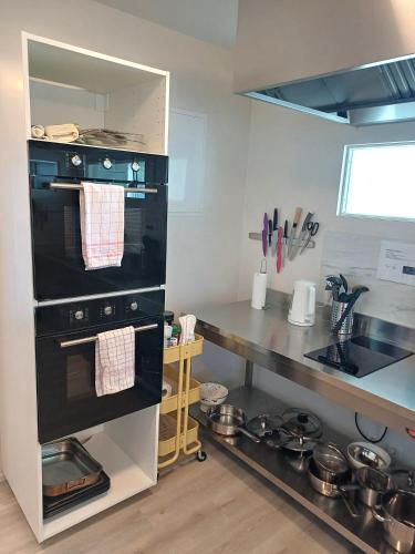 Kitchen, Lyngas Guesthouse in Egilsstadir