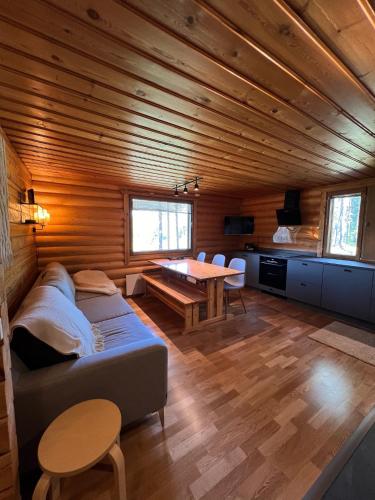 Logcabin, sauna, fireplace, view, kitchen in Yllasjarvi