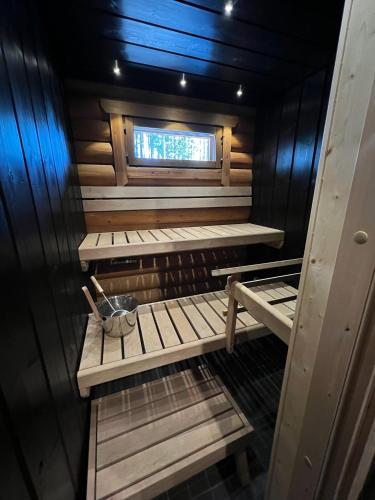 Logcabin, sauna, fireplace, view, kitchen in Yllasjarvi