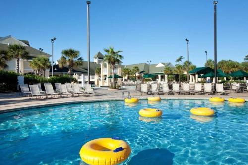 Resort living in this 2BD condo with pools, waterslides, and lazy river