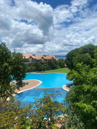 Swimmingpool, Villa (170 m²), 4 Schlafzimmer und 3 eigene Badezimmer in Alitagtag (Club Balai Isabel Villa Estalilla ) near Taal Vulkan