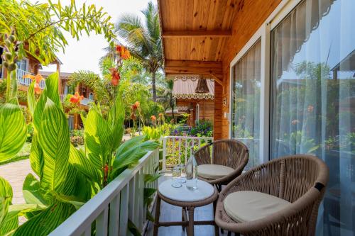 Balcony/terrace, Aralea Beach Resort By Stone Wood in Morjim