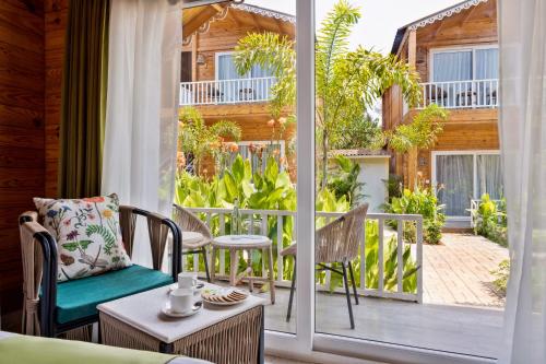 Balcony/terrace, Aralea Beach Resort By Stone Wood in Morjim