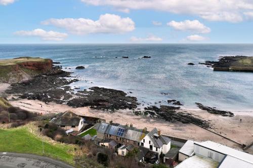 Beach front retreat with stunning views!