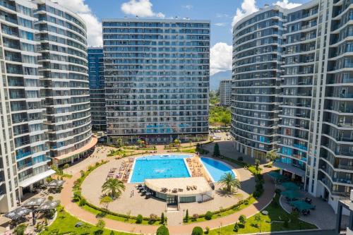 ROION Batumi Luxury 1BR Pool Oasis E1811 - Tap to explore photos