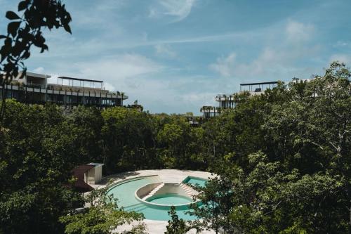 Beautiful Apartment with Terrace, Gym & Rooftop Pool with Panoramic Views in Tulum, Mexico