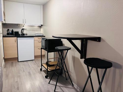 Konyha, Sentralt beliggende studioleilighet in Gol