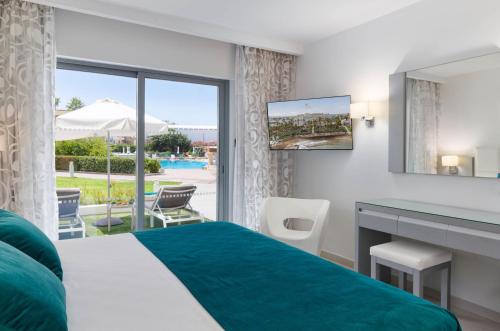 Suite with Garden View room in St George Beach Hotel & Spa Resort