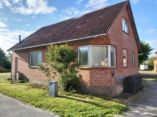 Vista exterior, Døssinghus Holiday Apartments in Kjellerup