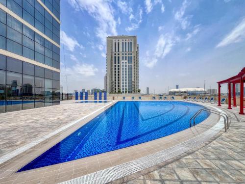Exterior view, JVC Studio Rooftop Pool & Gym Golf Course View near Dubai Sports City
