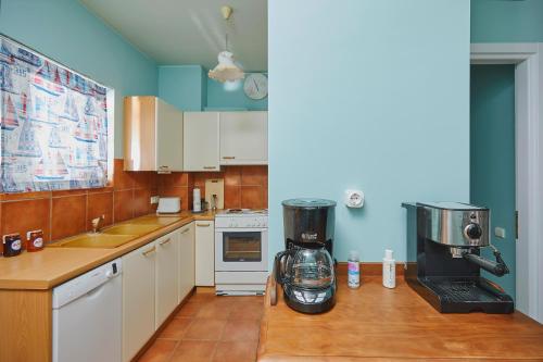 soft blue apartment near seaside - Tap to explore photos
