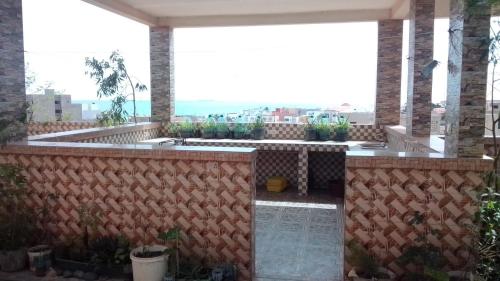 Uitzicht, LaBelleVue - penthouse en Sipres 5, plage in Rufisque